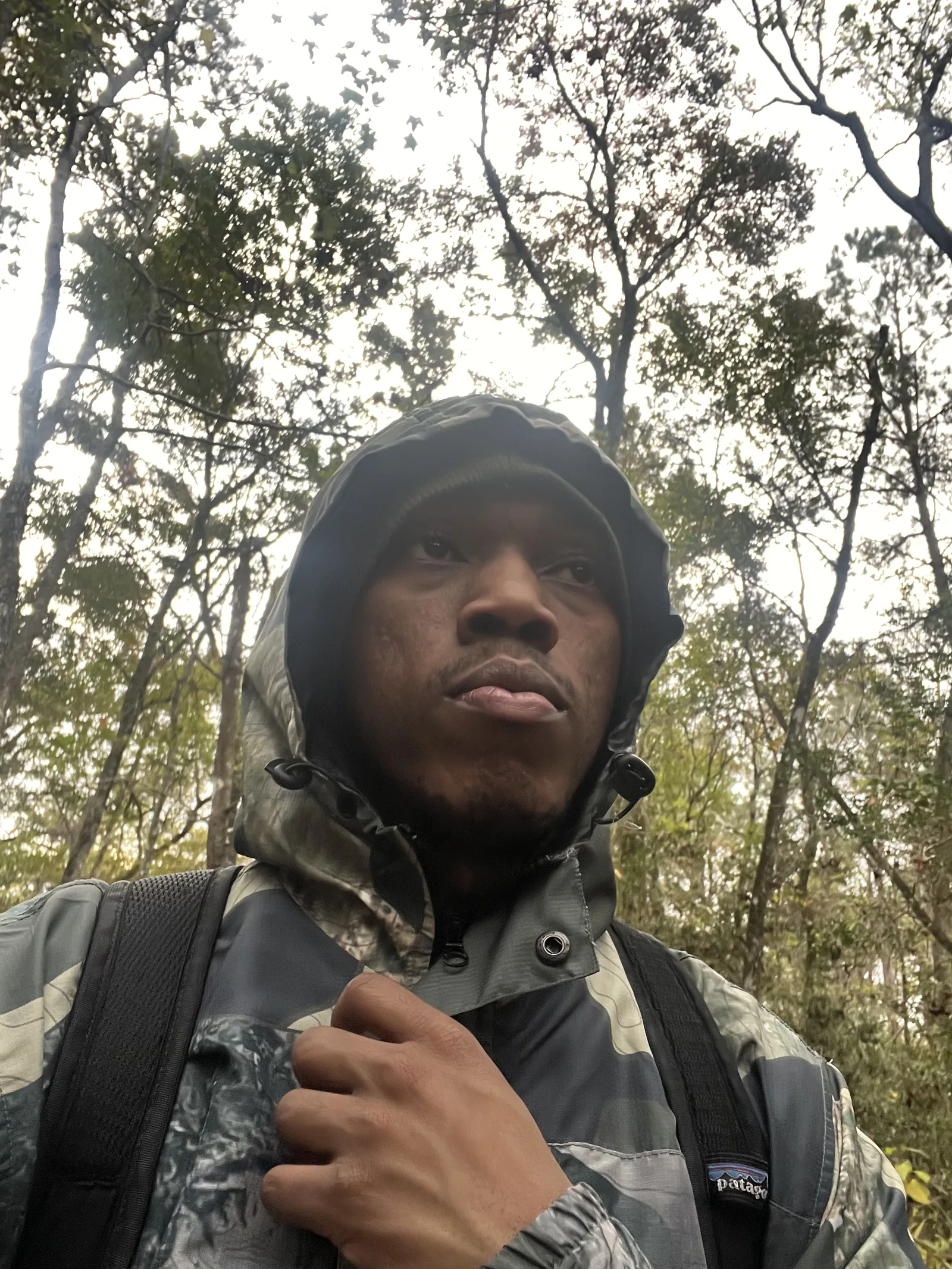 Udenna Nebeolisa hiking in the woods